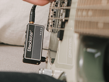 Blackstar Amplug Bass connected to a bass guitar